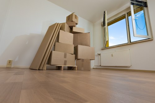 Careful loading of office furniture for collection