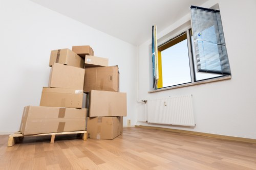 Packing and loading furniture into a removals van