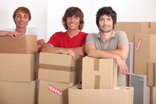Packed boxes and furniture ready for a van removal job in Edgware