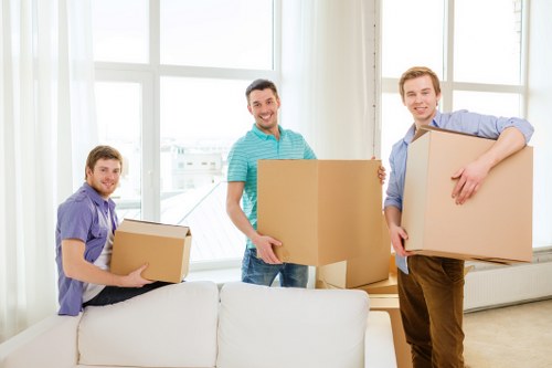 Packed boxes and furniture ready for home removal