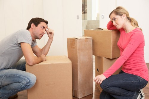 Worker assessing a move route and handling items carefully